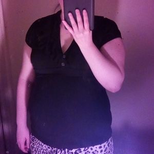 Black frilly button top